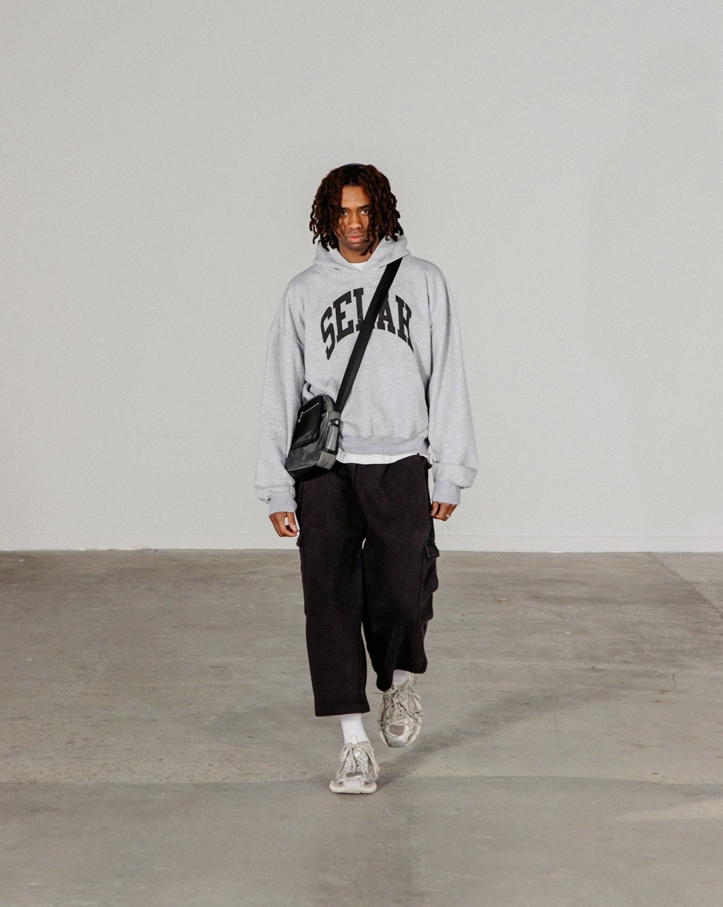 "NOIR" 3/4 LEG UTILITY SWEATPANTS